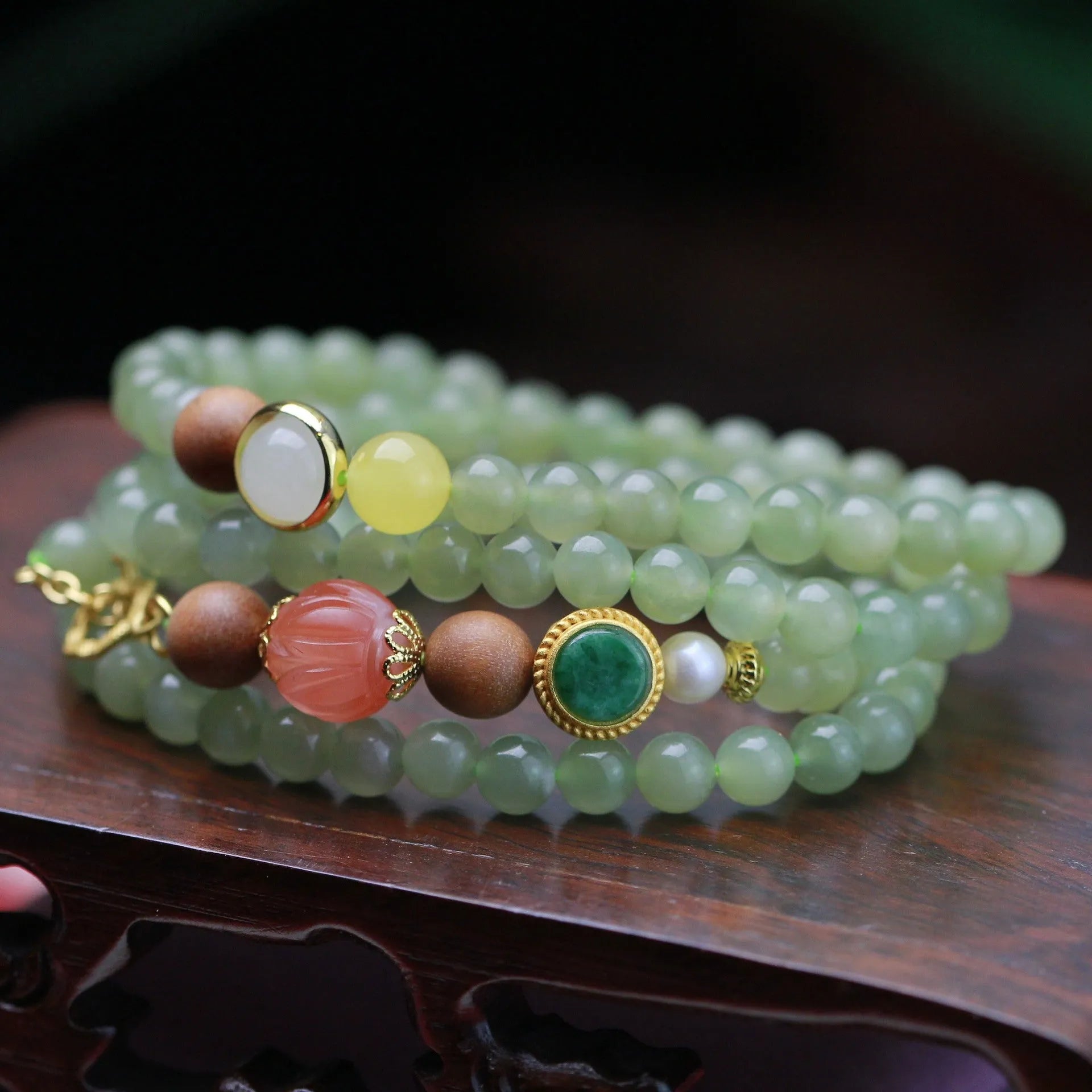 Hetian jade lotus bead necklace and bracelet set with white sandalwood and beeswax accents.
