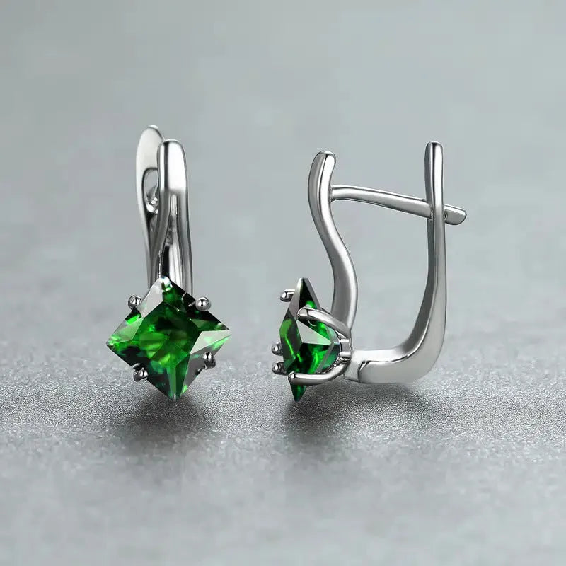 Women's copper earrings with inlaid zircon creating a diamond design, shown in blue, green, and colour options.
