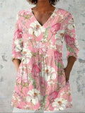 Women's slim fit long-sleeved top with a retro all-over digital print, shown in a selected colour.