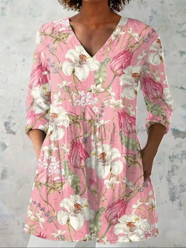 Women's slim fit long-sleeved top with a retro all-over digital print, shown in a selected colour.