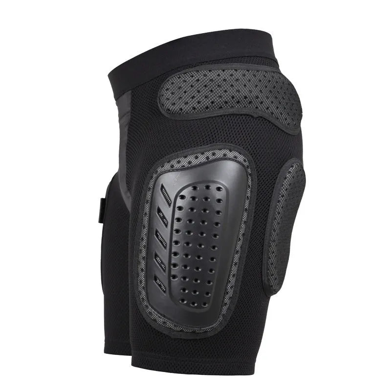Black cycling hip protection pants shown flat, highlighting the hip pad area and available in sizes S, M, L, XL.