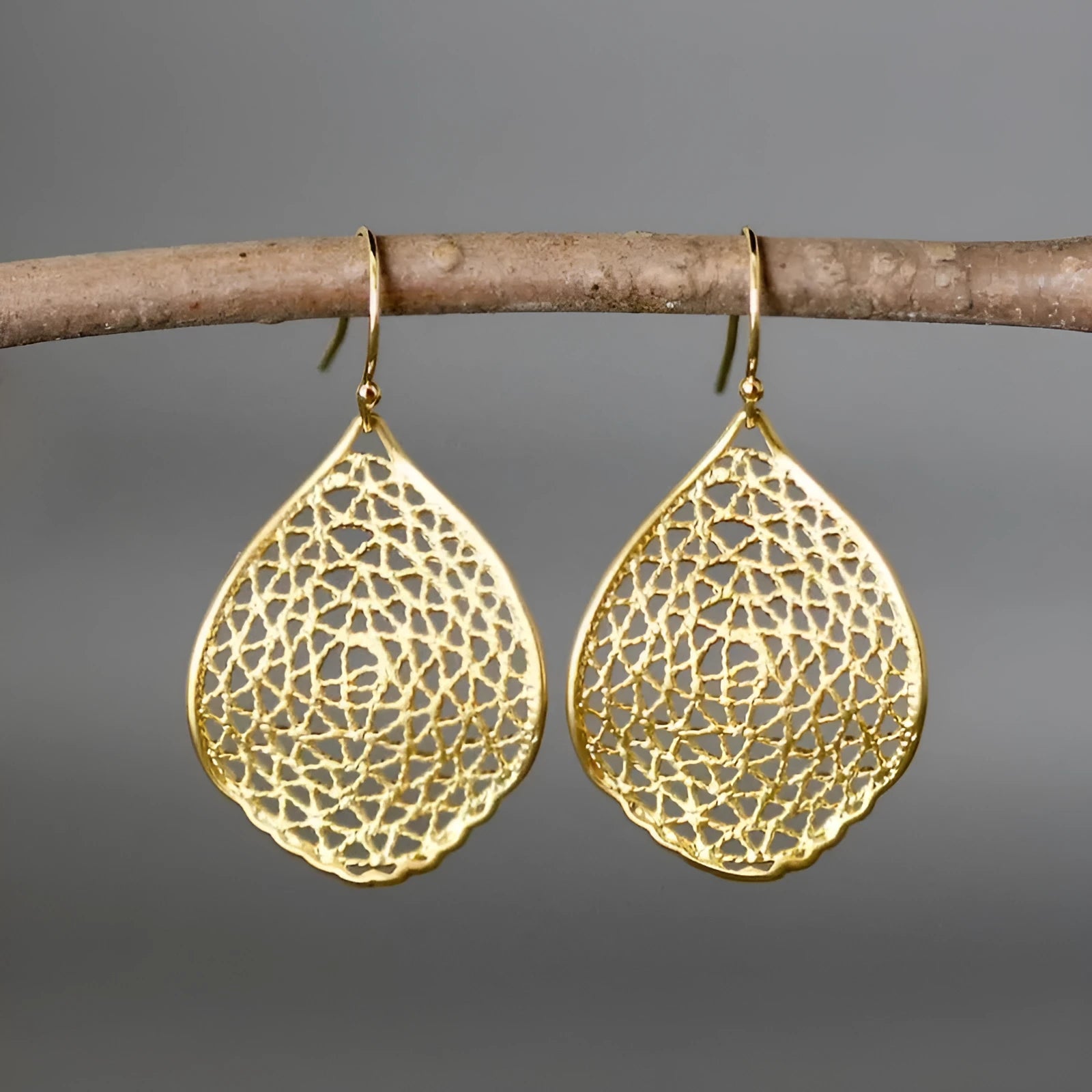 Gold retro leaf hollow drop pendant earrings with vintage design