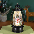 Crystal ball portable oil lamp Christmas decoration with light-emitting feature and snowman or elderly figure.