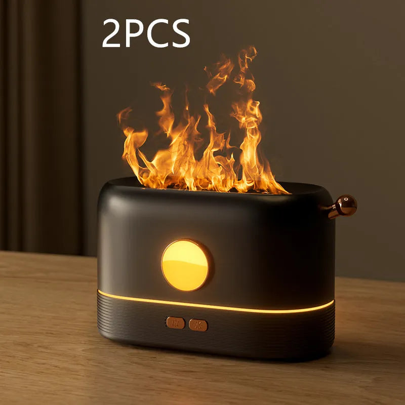 Black simulation flame USB humidifier with colour changing LED light on a desktop