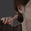 Sterling silver needle ear strings with hanging pearl and geometric designs for female wearers