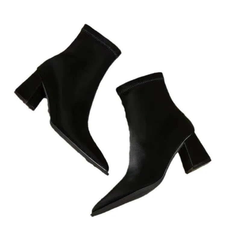 Women's khaki stretch suede pointed toe ankle boots with wedge heels on white background