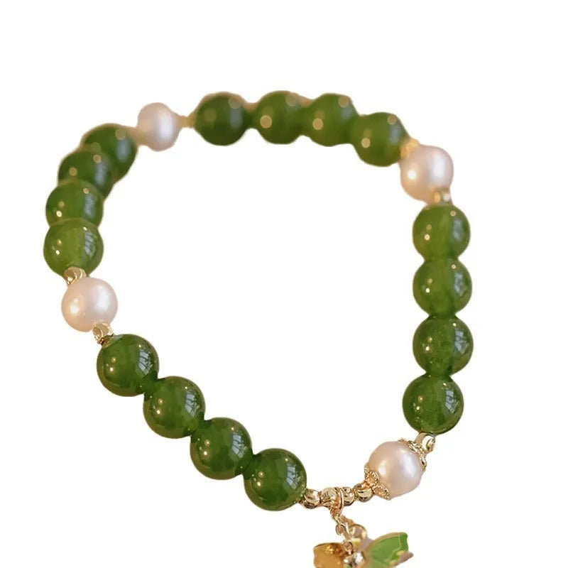 Natural green chalcedony bracelet with round beads and minority design elements for women