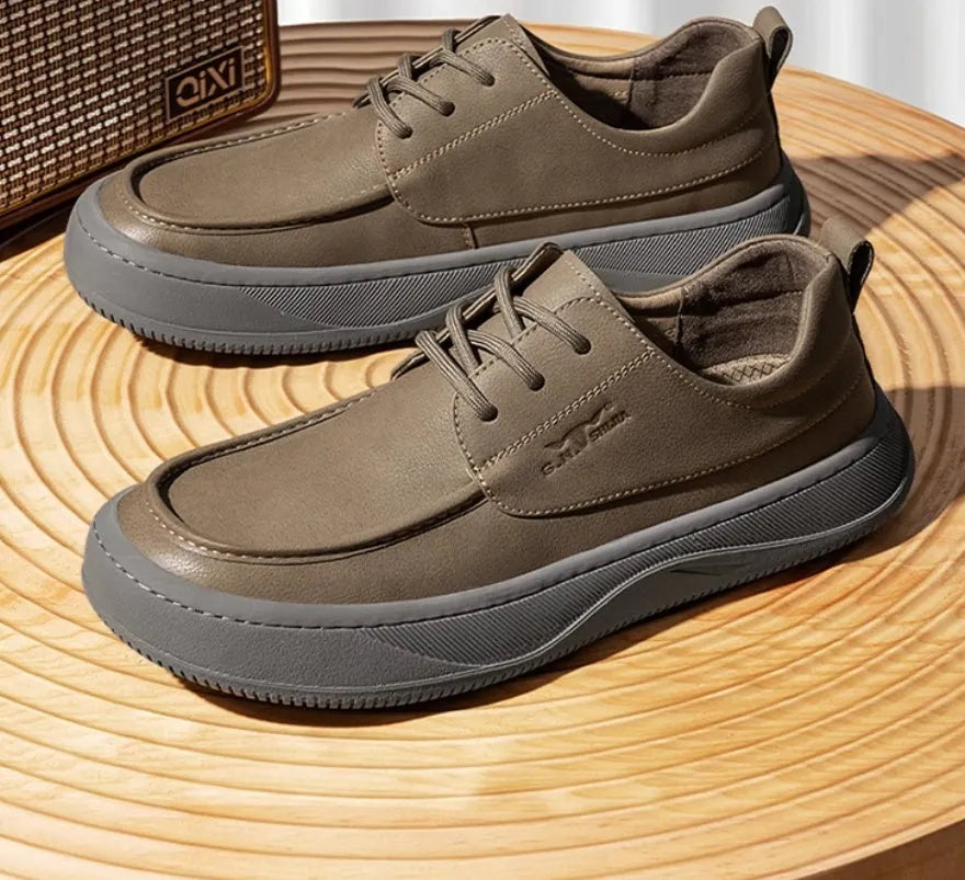 Brown retro-style casual leather shoes with big toe design on a neutral background