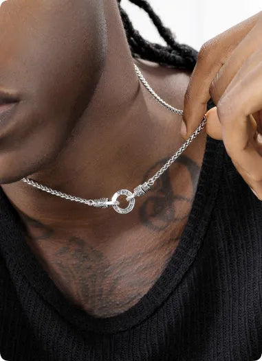 S925 sterling silver clavicle necklace with delicate chain and pendant, shown on a model.