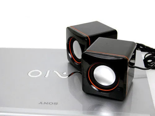 Small square black USB computer speaker with compact desktop design for PC audio