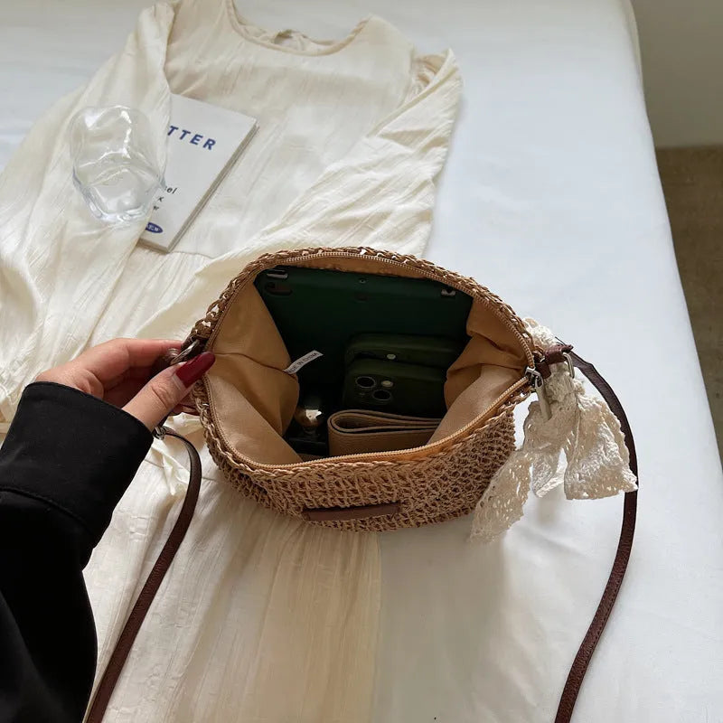 Women's woven straw messenger bag with hollowed pattern design in beige colour