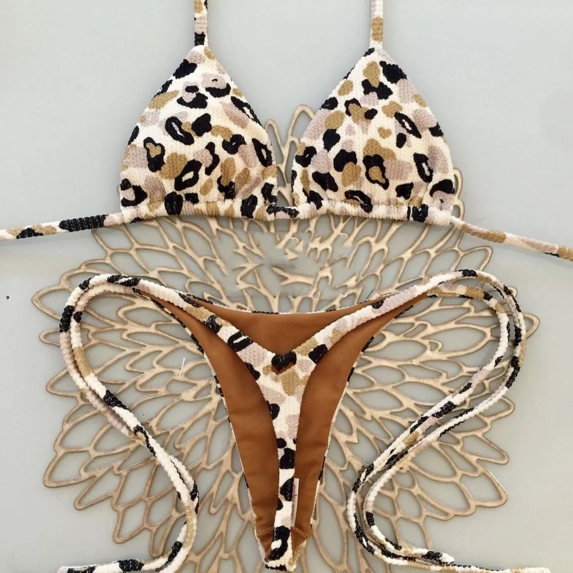 Women's printed bikini swimsuit in briefs style with cotton lining, shown in colour RT2110
