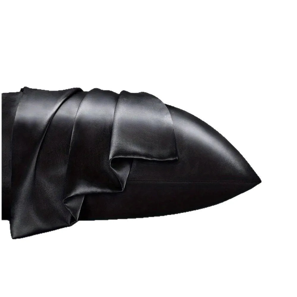 A pair of solid colour satin pillowcases made from polyester fabric, showing available size and colour options.