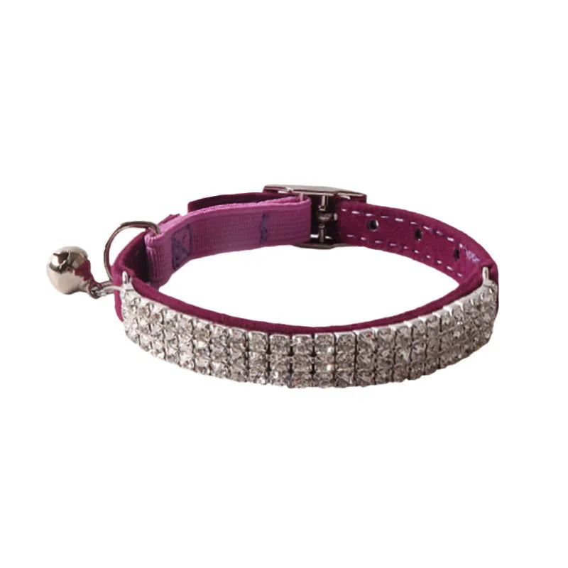 A flocking material cat collar with a flannel lining and an elastic buckle, shown in one of six colours.