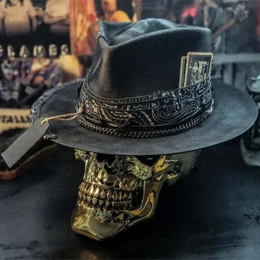 Handmade wool felt skull hat with a conical crown, shown in the colour Skull Hat.