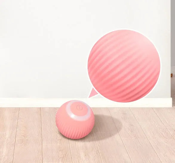 Green or pink 43mm automatic rolling ball cat toy with intelligent obstacle avoidance on a hard floor