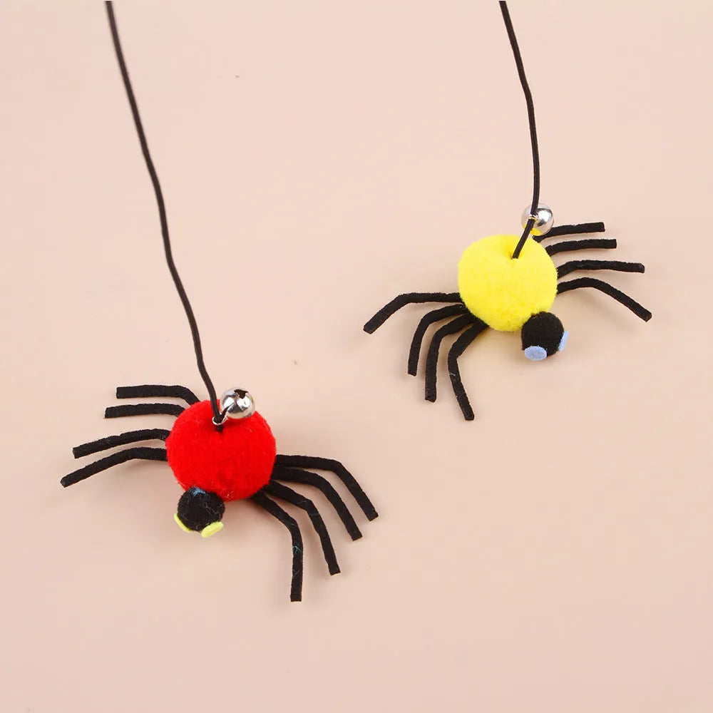 Red or yellow elastic rope cat toy with feather stick and fabric spider bell hanging from a door