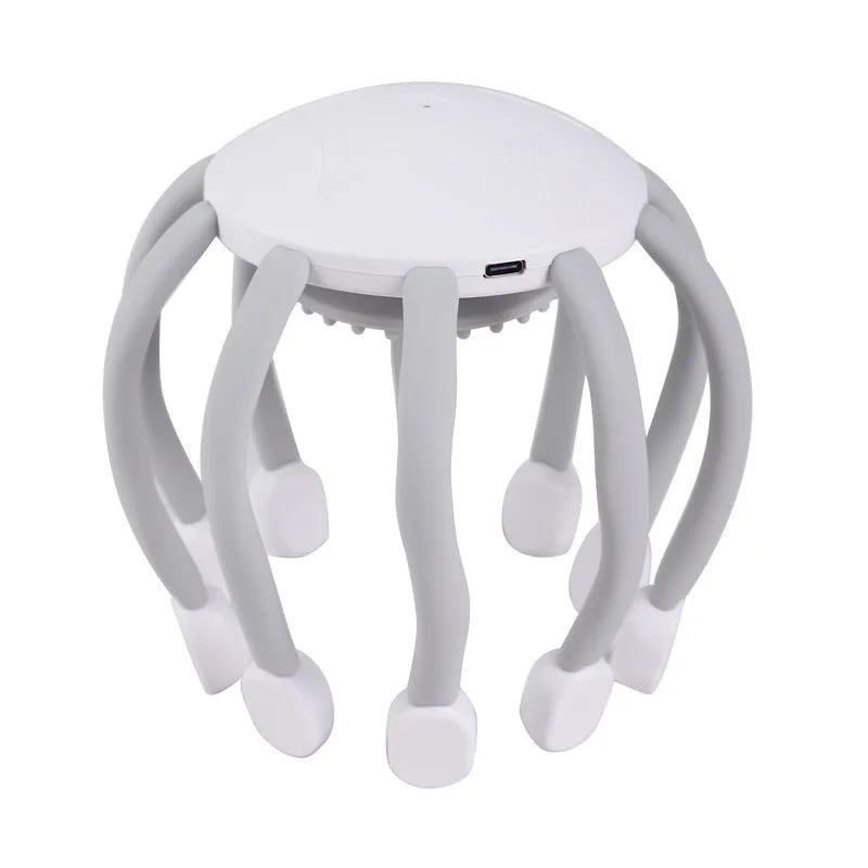 Black eight-claw electric head massager with USB cable on white background.