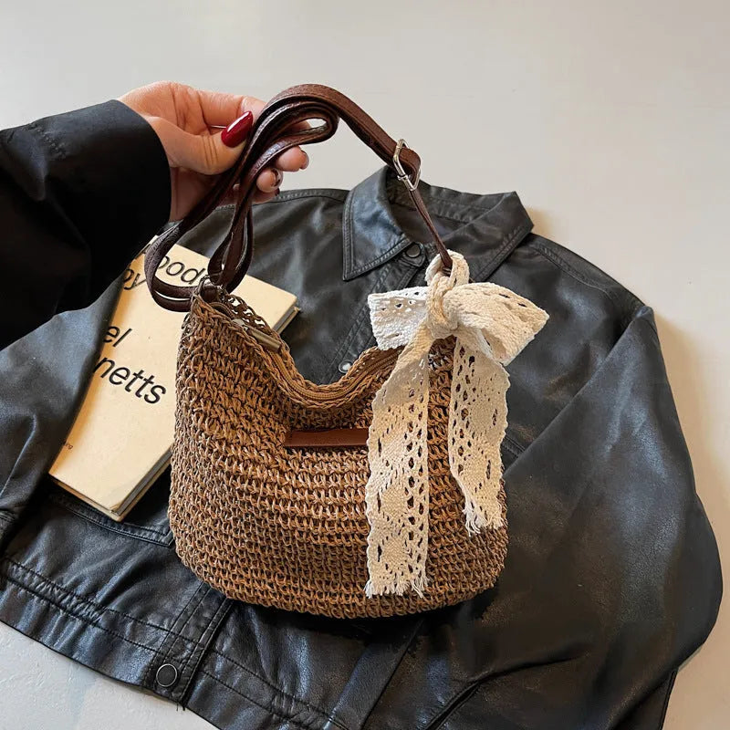 Women's woven straw messenger bag with hollowed pattern design in beige colour