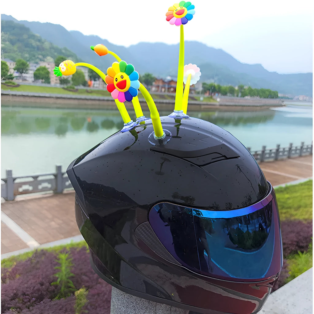 Yellow silicone sunflower helmet decoration with suction cup mount on a motorcycle helmet