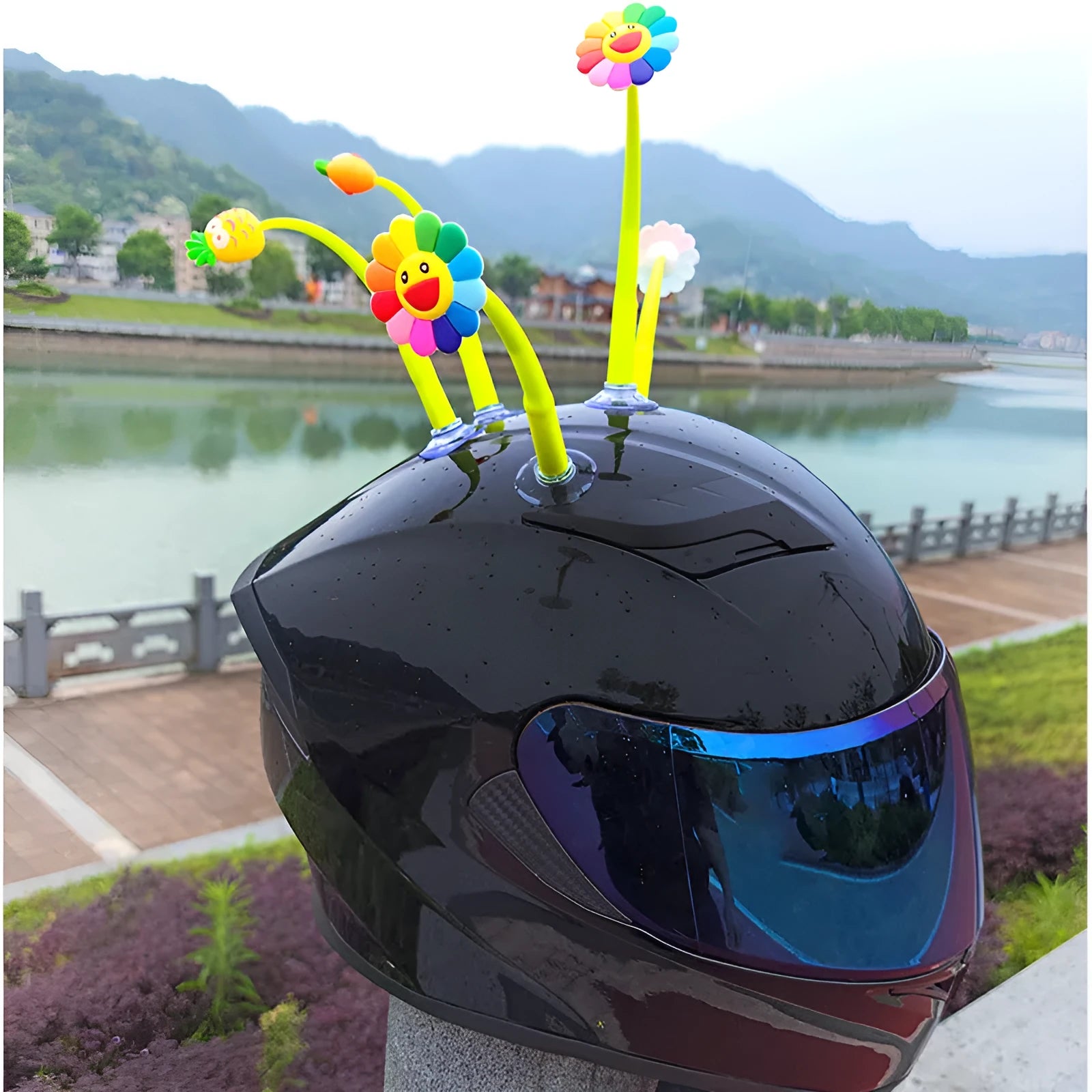 Yellow silicone sunflower helmet decoration with suction cup mount on a motorcycle helmet