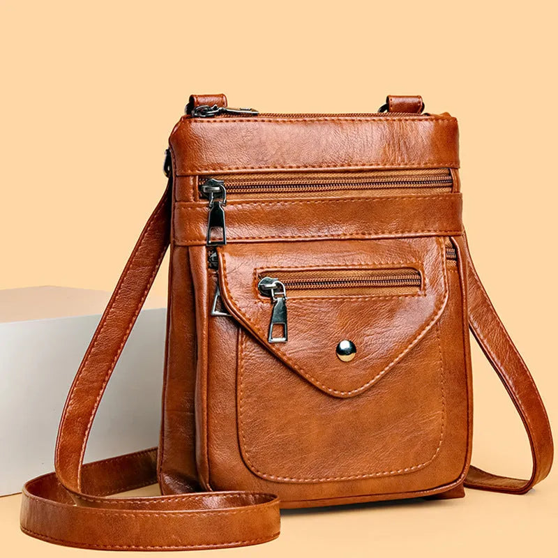 Vertical square crossbody mobile phone bag for women in PU material with sewing line detailing
