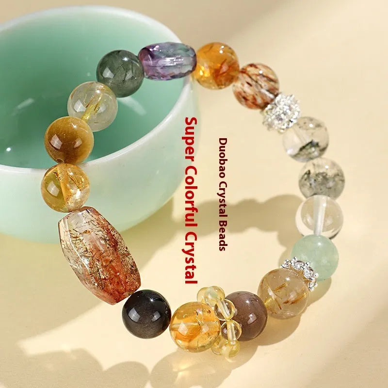 Natural crystal beaded bracelet with Duobao crystal beads in black gold Super Seven and natural colour variations