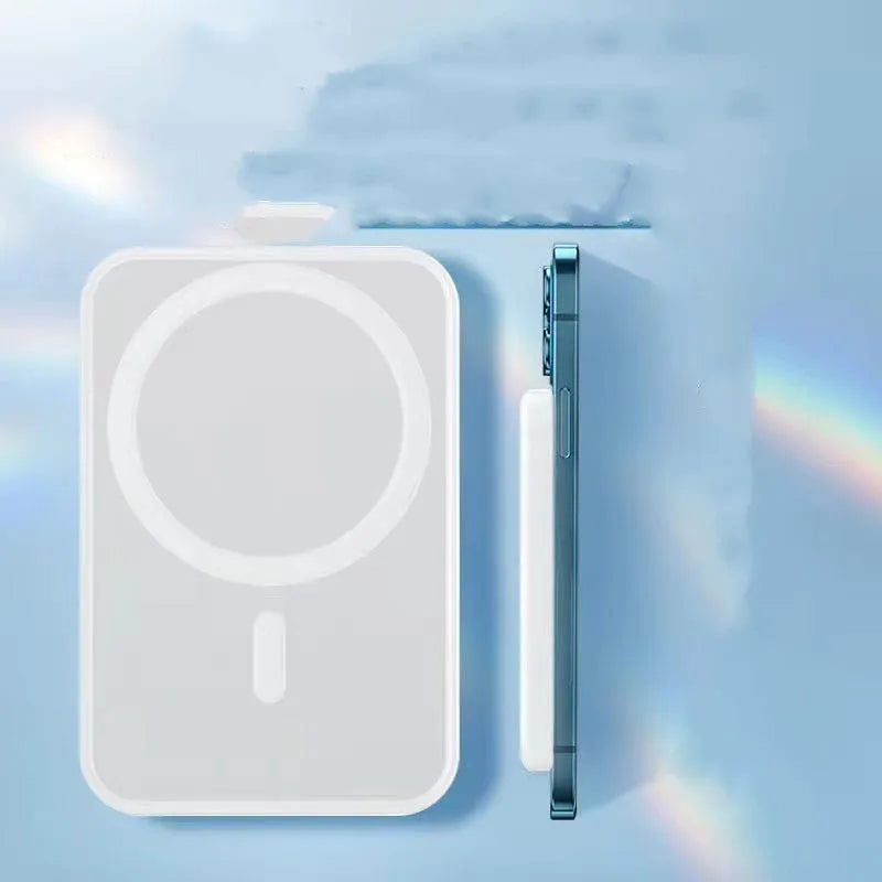 White magnetic wireless charging power bank with 5000mAh capacity on a table.