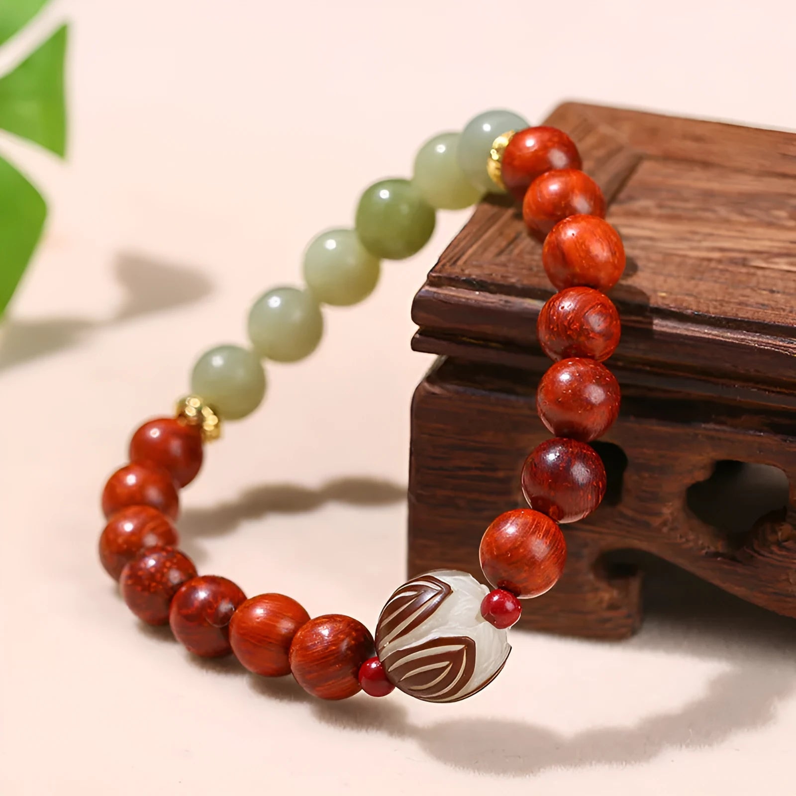 Red Rosewood and gray jade Bodhi Lotus bracelet for women with 12mm geometric beads.