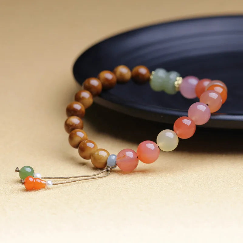 8mm diamond-cut agate bracelet with natural persimmon colour tones