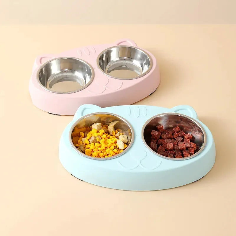 Plastic pet double bowl feeding tray in blue, green, or pink colours measuring 26.5cm long