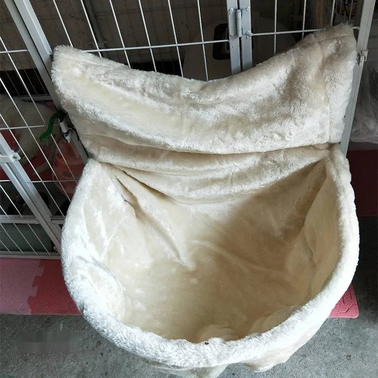 Grey iron frame cat hammock with fleece cloth bed suspended for a cat to lounge.