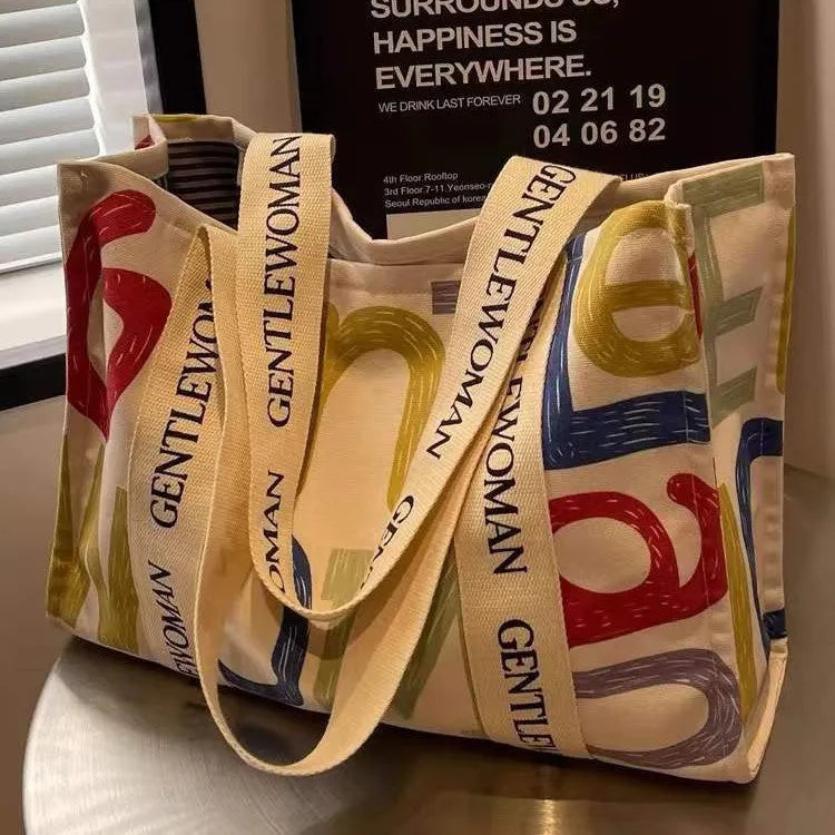 Women's canvas tote shoulder bag with large capacity and printed design options
