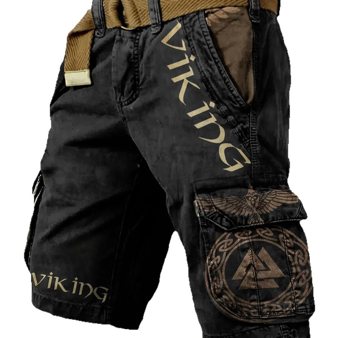 Man wearing black 3D digitally printed polyester shorts with a graphic pattern and zipper closure.