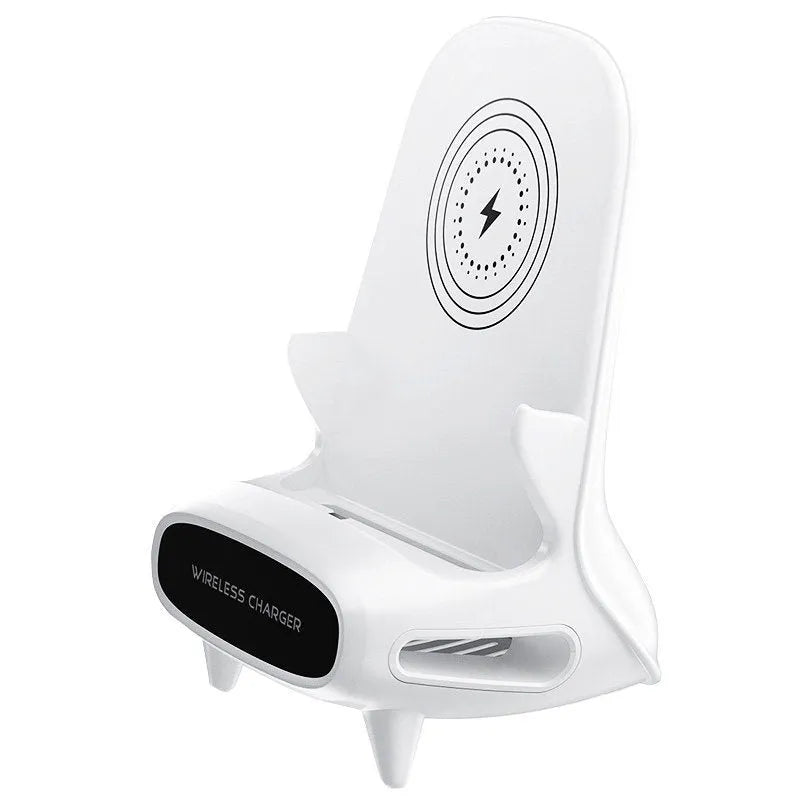 White wireless charging phone stand on a desk, charging a mobile phone at a viewing angle.