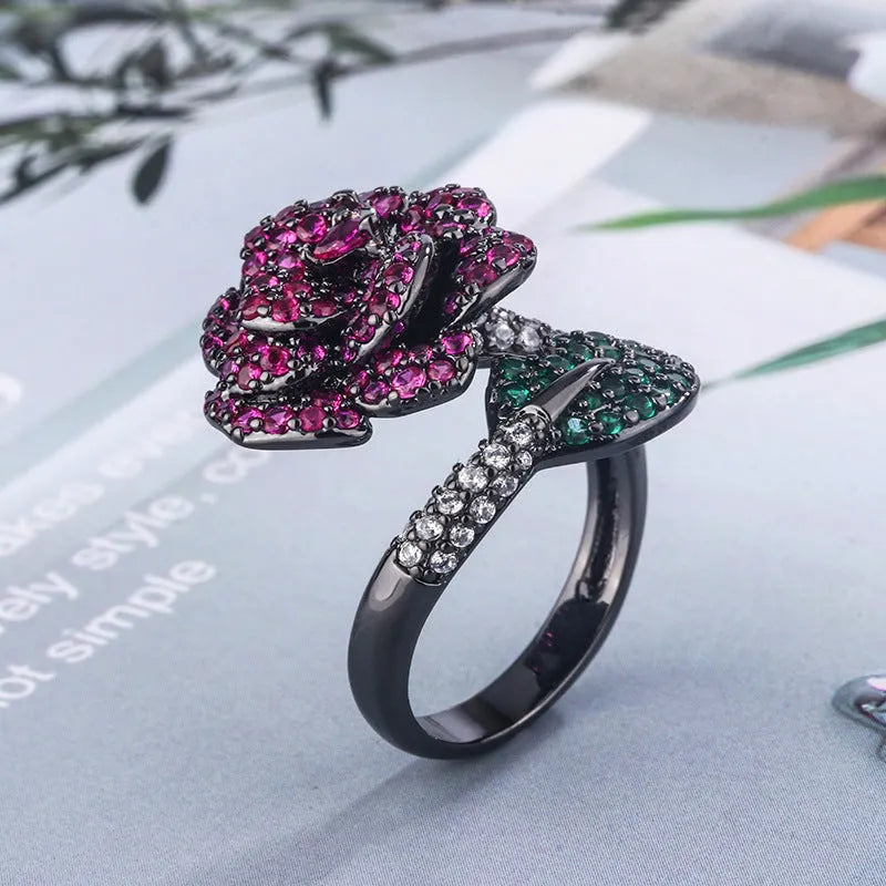 Gold-plated geometric flower ring with red stone for women, black gold colour