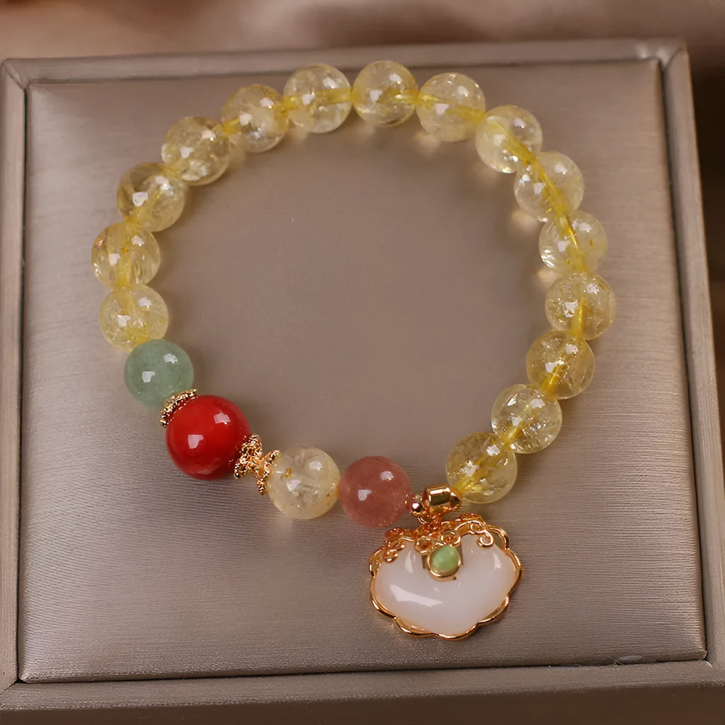 Women's citrine jade ruyi pendant bracelet with yellow crystal detail on alloy metal