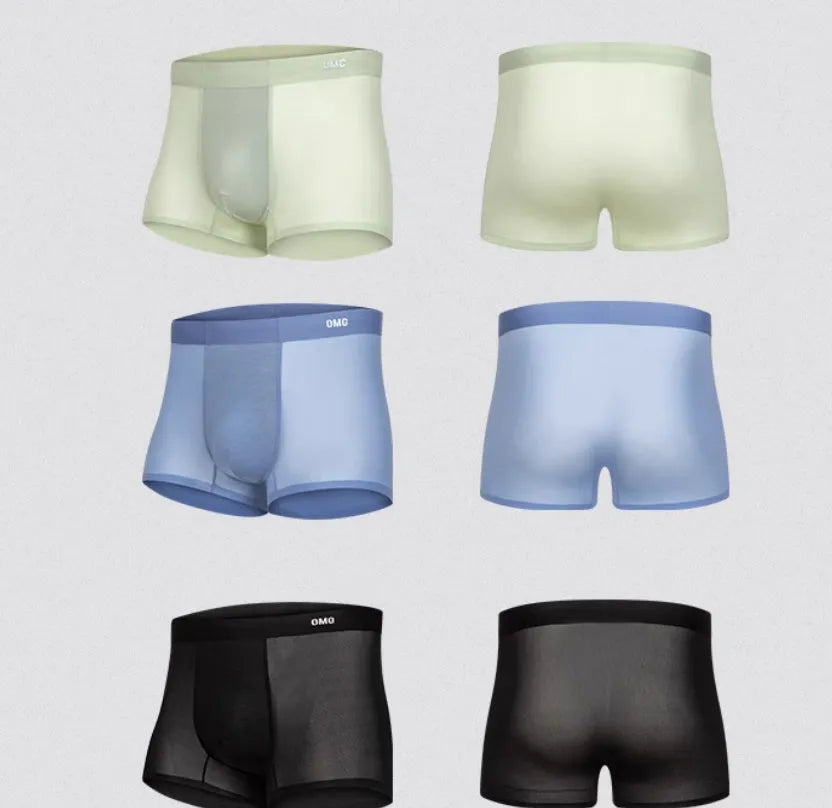 Lightweight seamless men's fitness underwear in black, shown flat, highlighting the antibacterial lining and stretch fabric.