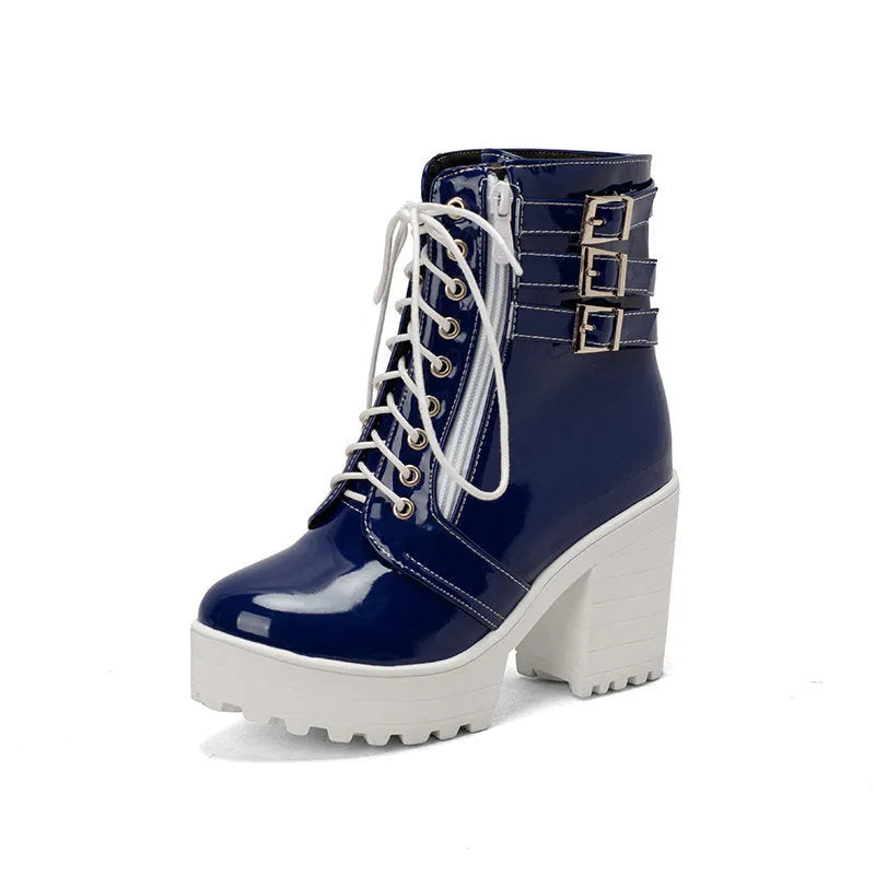 Women's black chunky heel ankle boots with lace-up front and round toe.