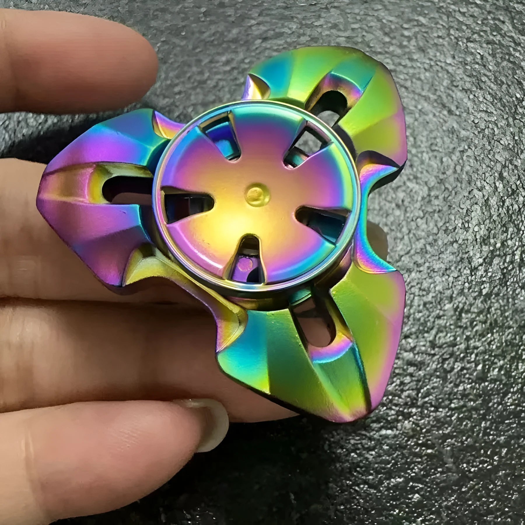 Alloy metal rotating fingertip gyro decompression toy in gun colour and colourful options.