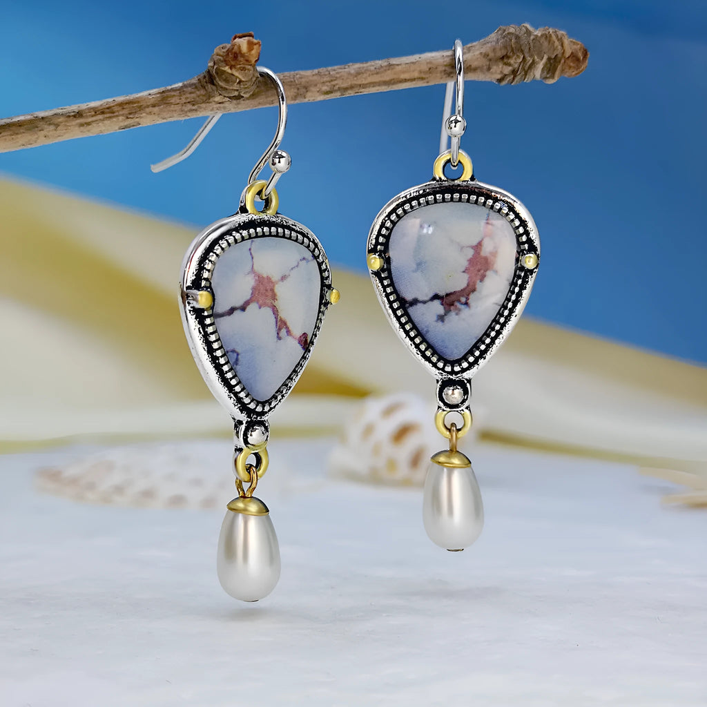 Blue retro bohemian drop earrings with synthetic opal and pearl details on electroplated metal
