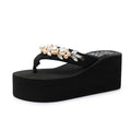 Women's high-heeled flip-flops in beige and black with a cotton cloth upper, shown in various sizes.