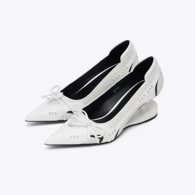 Black women's Mary Jane shoes with a pointed toe and a unique floating special-shaped heel.