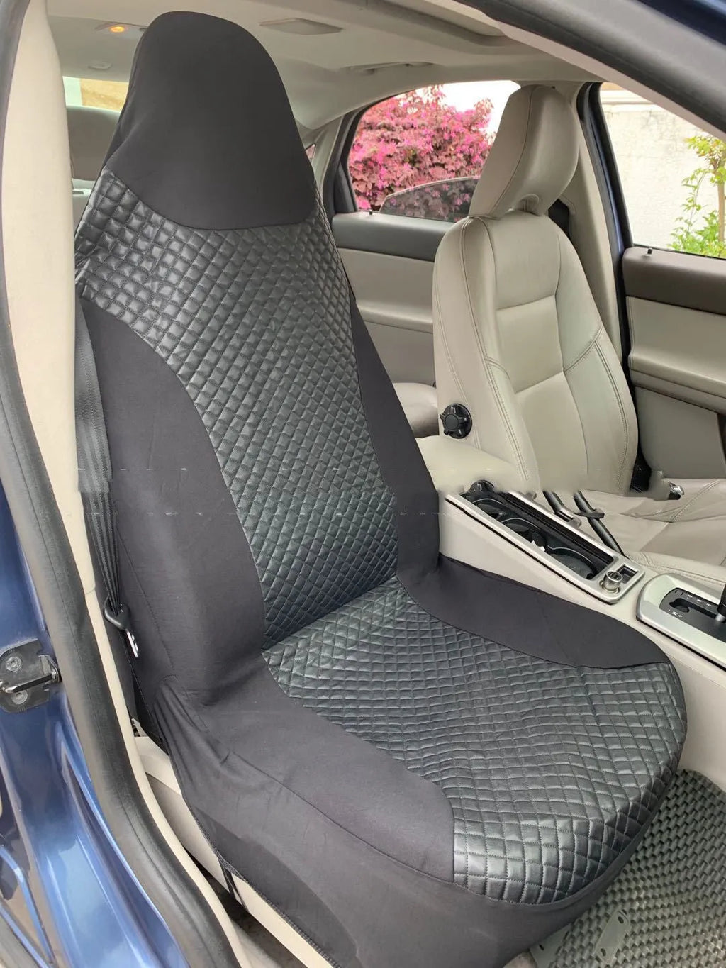 Black quilted automotive seat cover with PU and polyester fabric construction