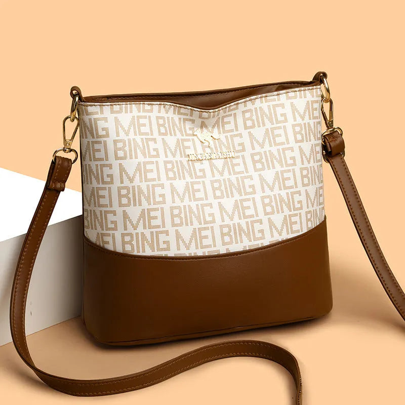 Brown soft leather messenger bag showing three-dimensional pocket and internal organisation compartments