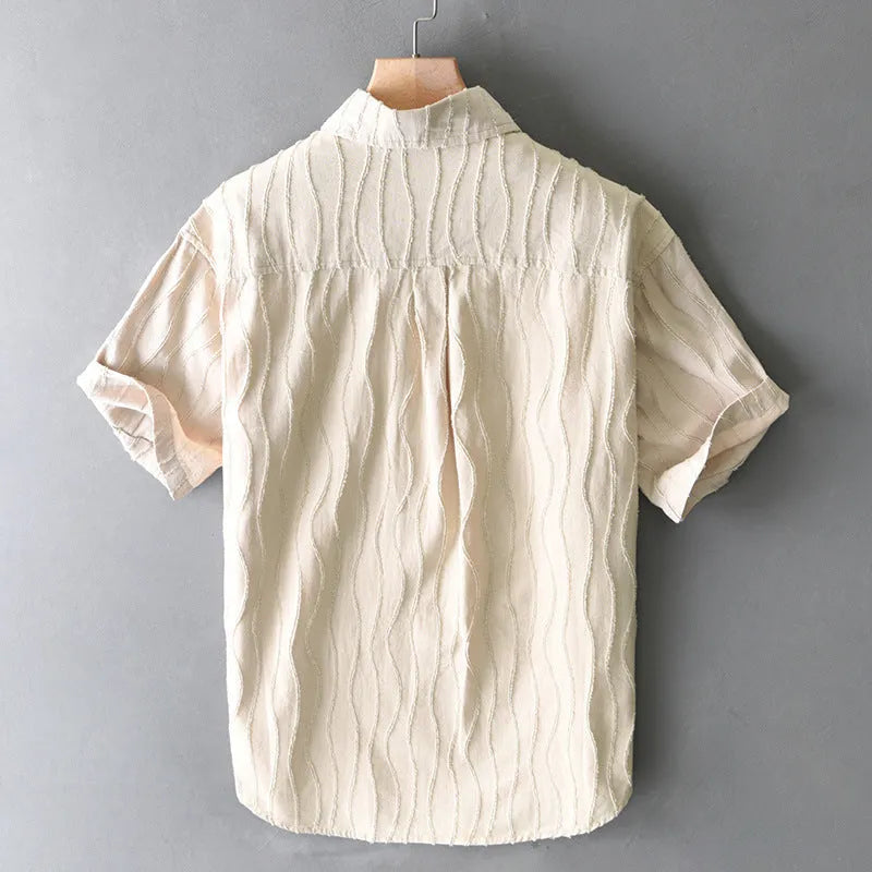 Men's apricot pure cotton casual shirt with short sleeves on a hanger