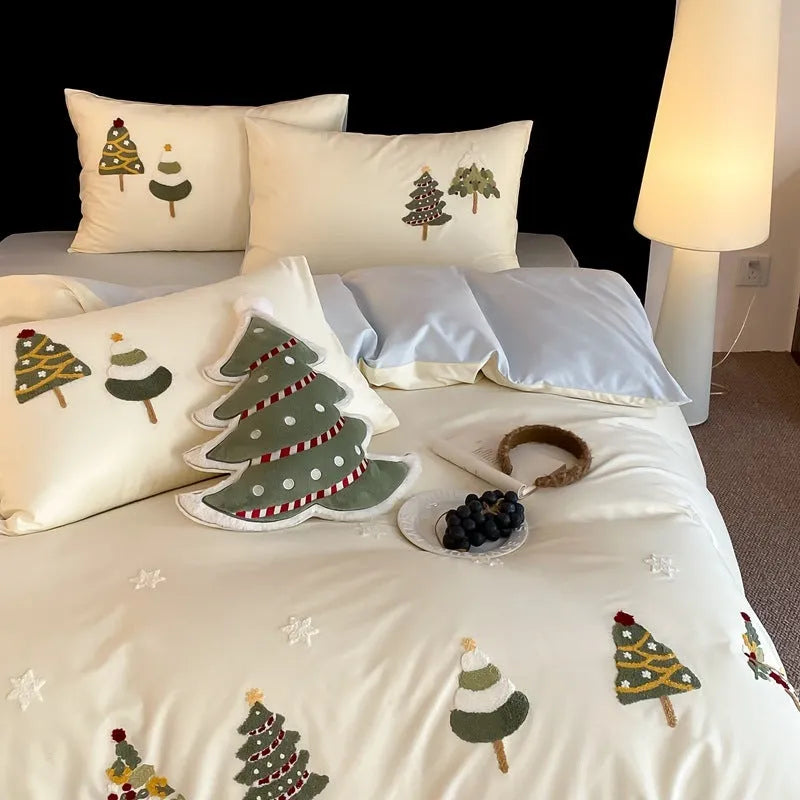 Pure cotton duvet cover and pillowcases with embroidered Christmas tree and floral pattern.