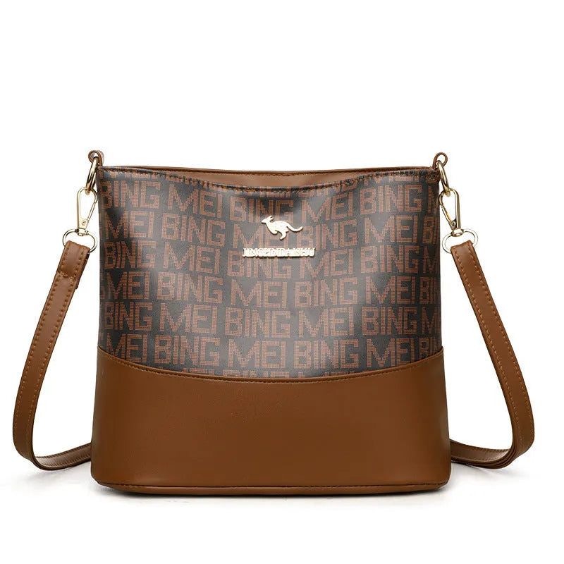 Brown soft leather messenger bag showing three-dimensional pocket and internal organisation compartments