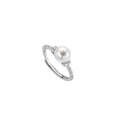 Adjustable antique twist copper ring with a central pearl inlay, shown in gold and silver tone finishes.