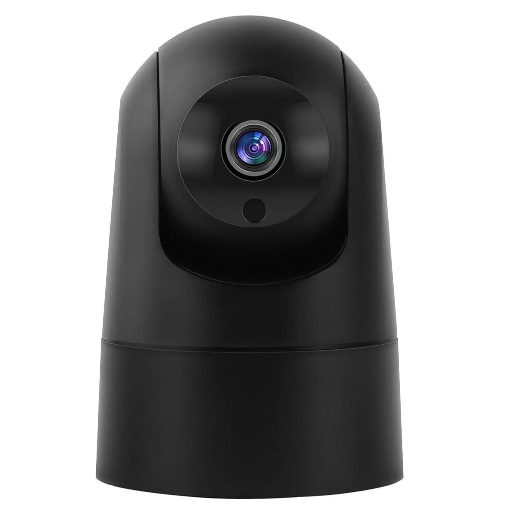White indoor security camera with adjustable lens on a desk next to its power adapter.